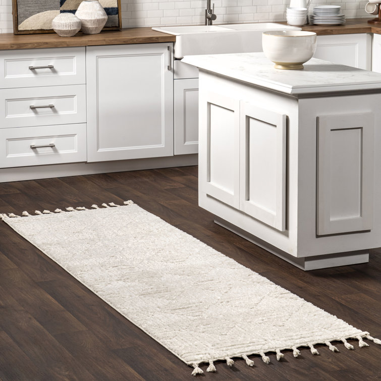 Kerry Textured Geometric Tasseled Area Rug