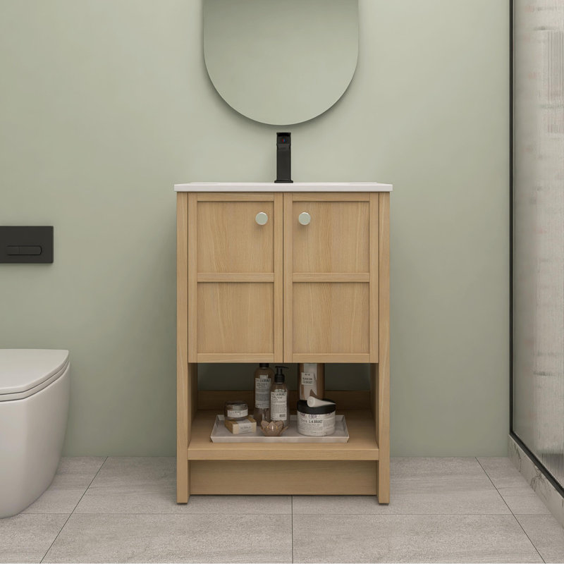 Meuble-lavabo autoportant de 24 po avec lavabo en céramique et 2 portes à fermeture douce