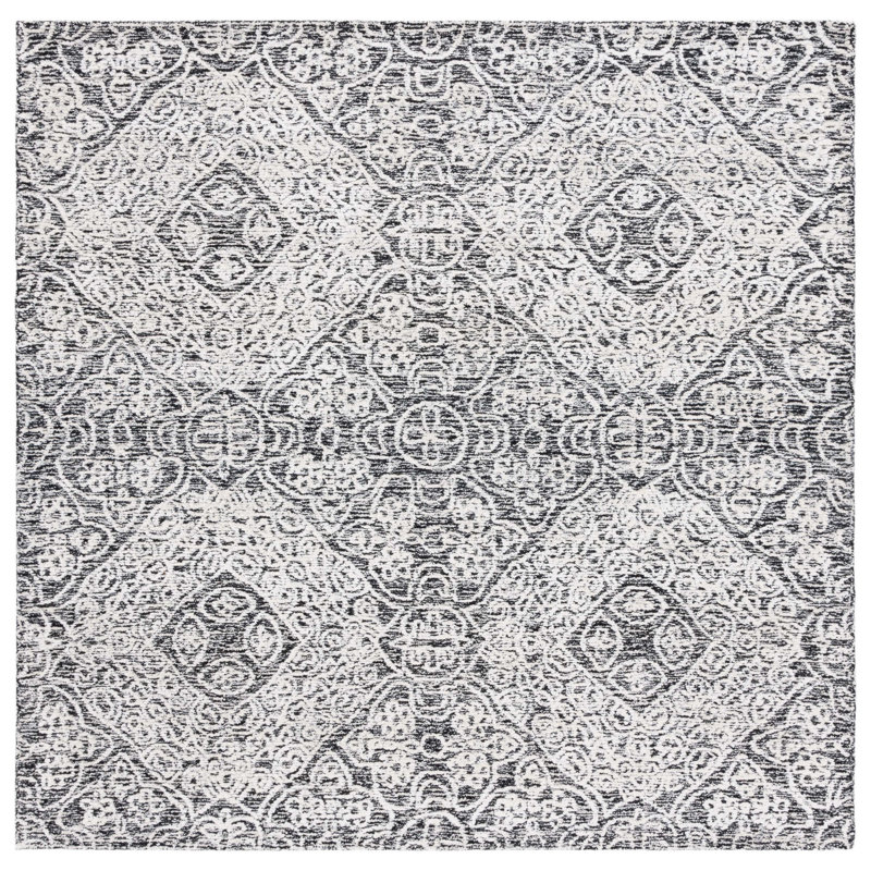 Handmade Black and Ivory Geometric Wool Area Rug