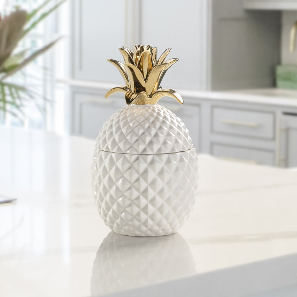 https://assets.wfcdn.com/im/12942482/resize-h600-w600%5Ecompr-r85/2373/237324437/Duffey+Pineapple+Ceramic+Storage+Jar.jpg