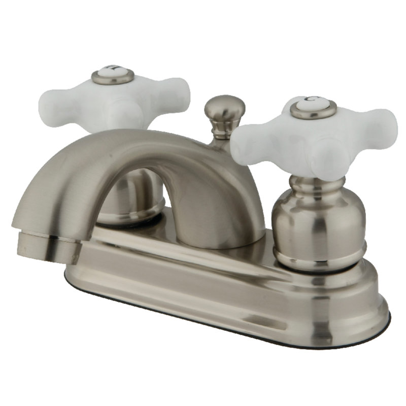 Kingston Brass Two-Handle 3-Hole Deck Mount 4" Centerset Bathroom Faucet with Plastic Pop-Up
