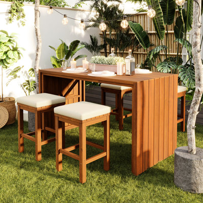 Bar d'extérieur 5 pièces avec tabourets rembourrés en bois naturel et beige pour les rassemblements de coussins de détente au bord de la piscine