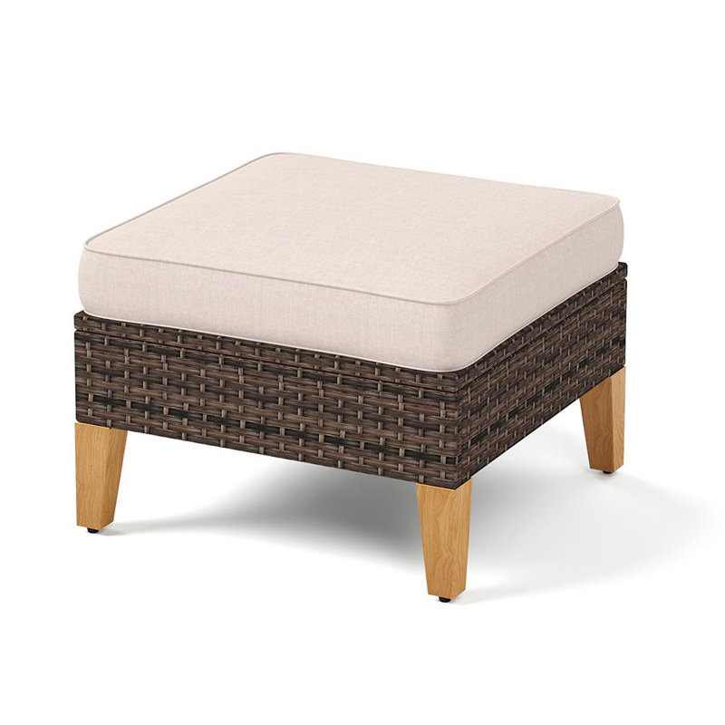 Repose-pieds d'extérieur en osier avec coussin Henghold