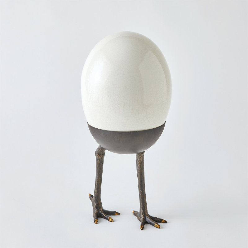 Oeuf d'autruche sur les pieds, Ivoire / Noir