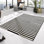 Panel Machine Woven Black/Cream Indoor Rug