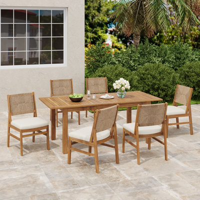 Nerra  7-Piece  Outdoor  Modern Rustic Acacia Wood Expandabledining Set With Handwoven Wicker Chairs And Water-Repellent Cushions