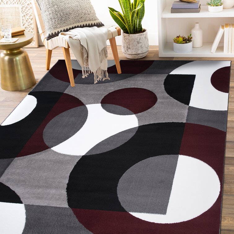 https://assets.wfcdn.com/im/12965284/resize-h755-w755%5Ecompr-r85/1977/197708638/Amirr+Geometric+Burgundy+Area+Rug.jpg