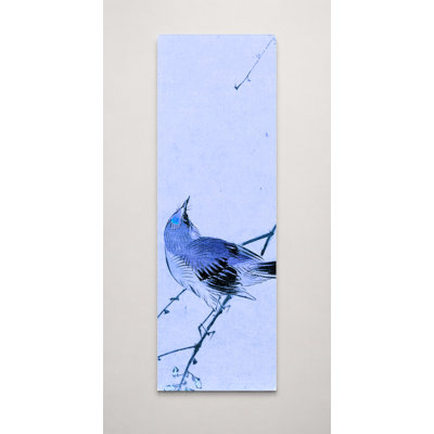 Oiseau sur une branche en fleurs