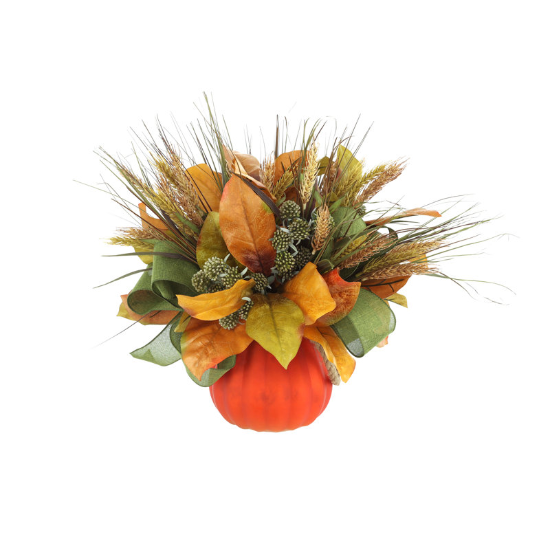 Feuille de magnolia Catron et blé disposés en pot de citrouille en verre