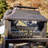 Courter 29" Rectangle Bronze Finish Steel Outdoor Fireplace with Log Storage