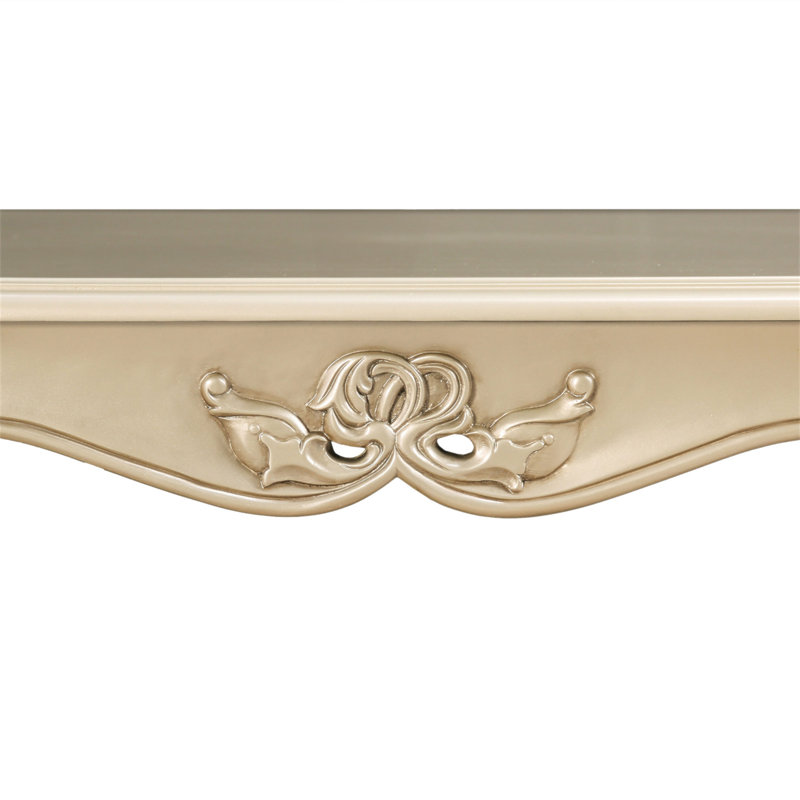 Table basse de style traditionnel avec pieds courbés et structure sculptée en bois massif, Champagne