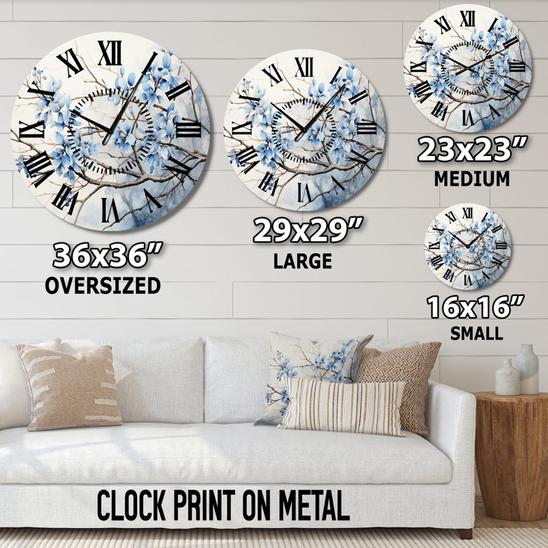 Horloge murale bleue et grise avec feuilles sur une branche, Médium