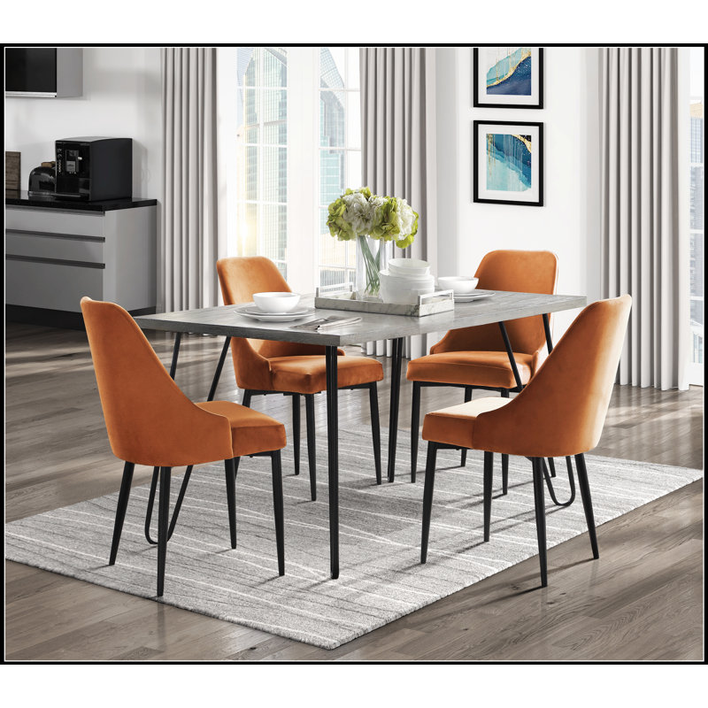 Ensemble de salle à manger moderne et élégant 5 pièces avec chaises en velours orange et structure en métal pour un repas élégant et confortable