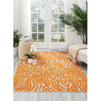 Tapis orange à rayures Newton