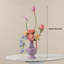 Ornements de fleurs simulées