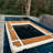 Portable inflatable floating ocean pool with net, yacht slide dock platform