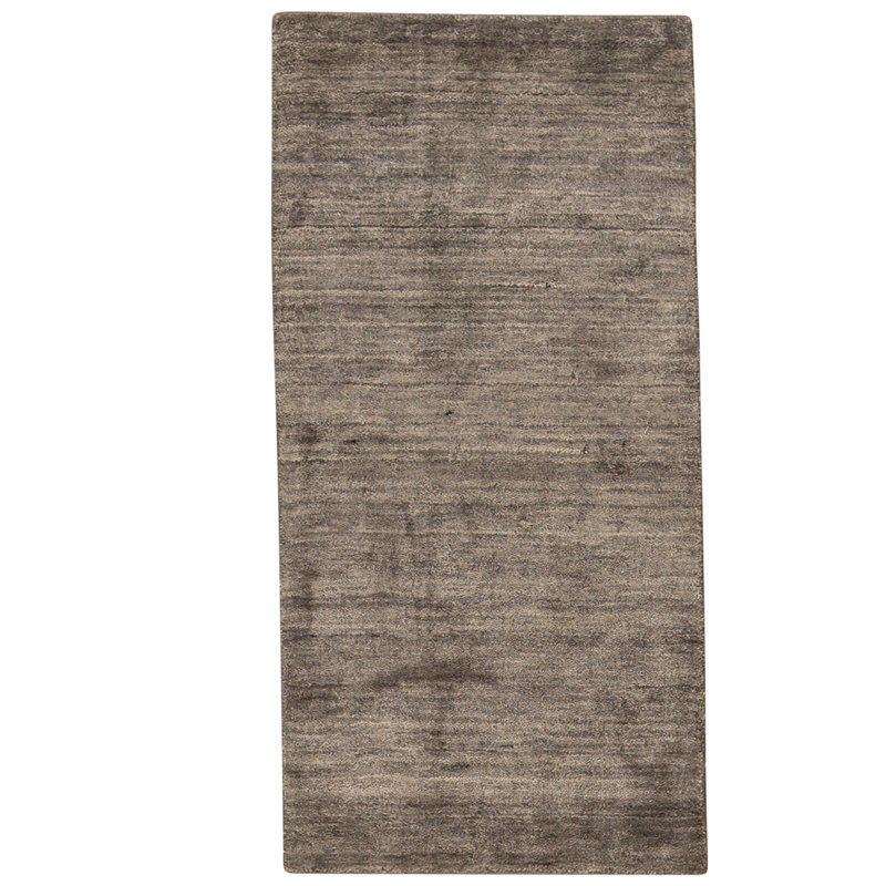 Tapis gris foncé noué à la main