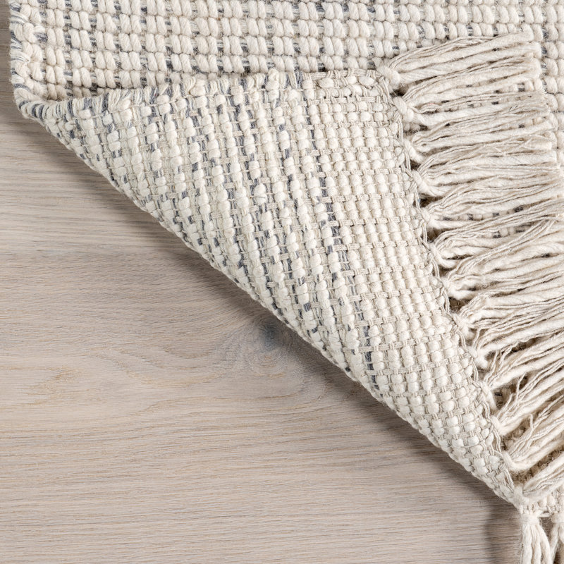 Handmade Ivory Wool Rectangular Area Rug with Fringe