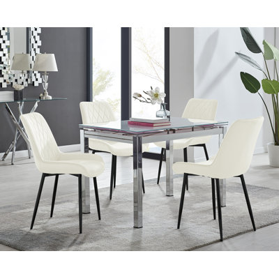 Ensemble de table de salle à manger extensible en verre et en métal Tierra et 4 chaises de salle à manger rembourrées en velours