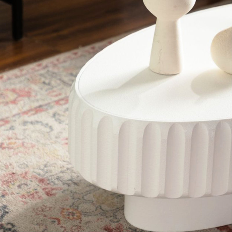 Table de rangement cannelée blanc crème avec couvercle amovible, design rond et ovale, à poser au sol pour les chambres, rangement ouvert, construction moderne, profondeur 112 cm, idéale pour les espaces de vie, montage rapide et facile