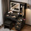 Meuble-lavabo noir cannelé 43 po avec miroir lumineux, station de charge, 5 tiroirs et armoire en verre, support pour sèche-cheveux, tabouret de rangement