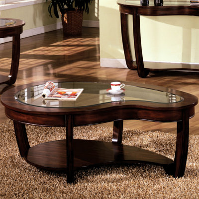 Table basse de luxe en cerisier foncé avec plateau biseauté en verre et biseauté