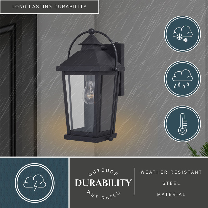Hanoverton 14.5 in. H 1-Light Textured Black Dusk to Dawn Sensor Traditional Outdoor Wall Sconce, Durable Steel, Clear Glass Shade, LED Compatible for Exterior Porch Patio Front Door or Garage