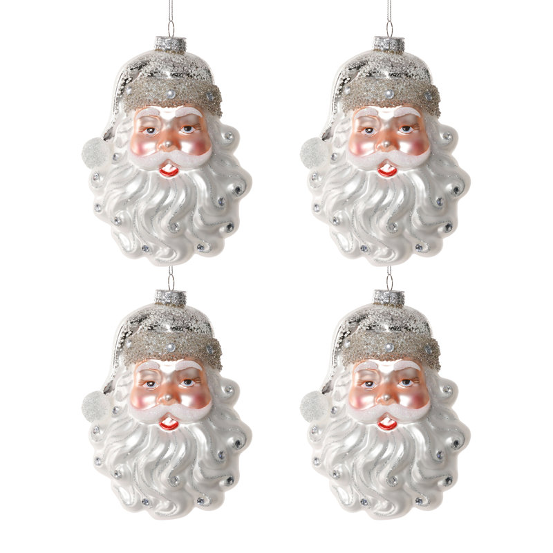 Ensemble de 4 décorations de Noël en verre représentant le Père Noël blanc