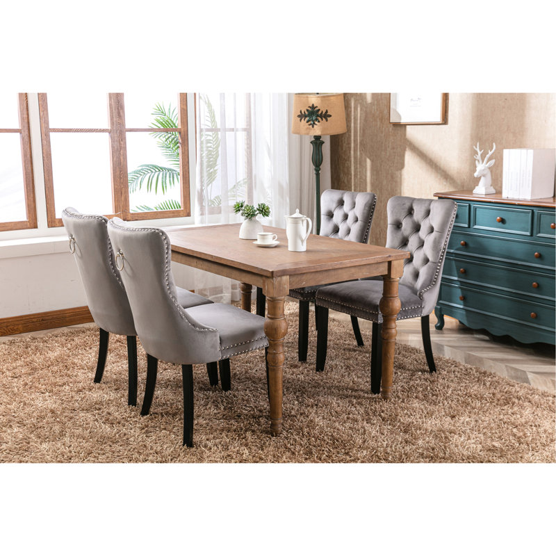 Chaise contemporaine en velours gris avec base en bois. Style haut, hauteur réglable, coussin en mousse confortable, 2 pieds solides et garniture cloutée. Design,