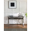 Bureau moderne avec plateau en verre et base en métal avec tablette