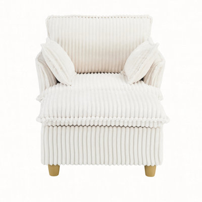 This single-seat corduroy sofa comes with an ottoman and throw pillows. It