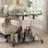 Kibwe Metal & Acrylic Bar Cart with Glass Shelves and Stemware Rack