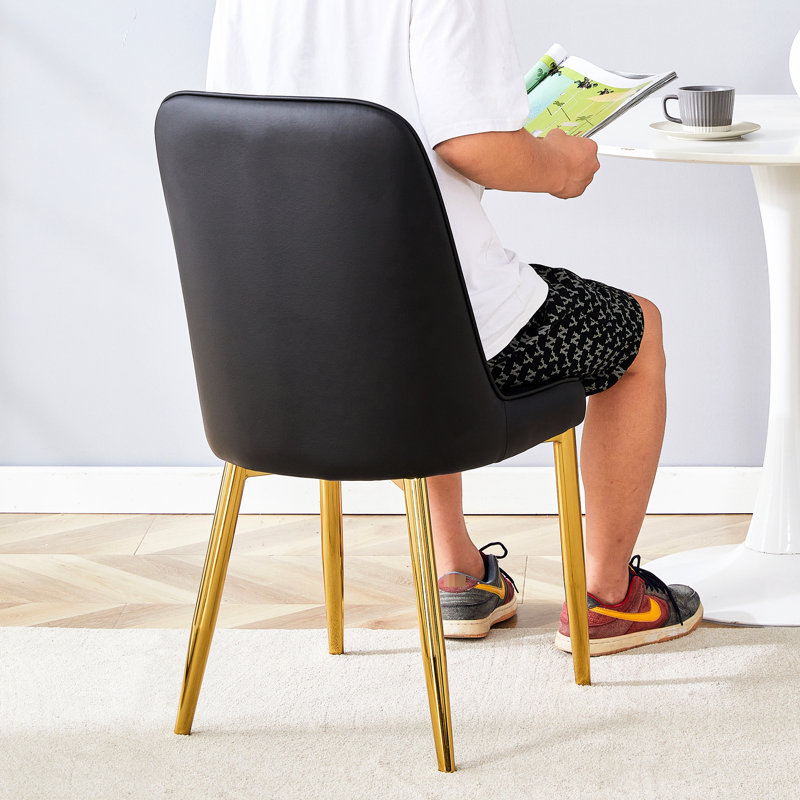 8 chaises de salle à manger, matériau en polyuréthane noir, pieds en métal, coussin de siège rembourré en éponge de conception moderne, pieds