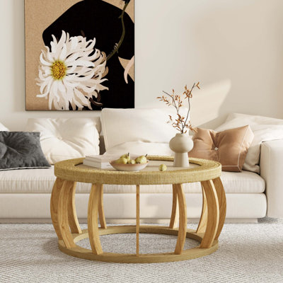 Table basse ronde vintage en bois massif de rotin avec pieds incurvés pour espaces de vie bohème