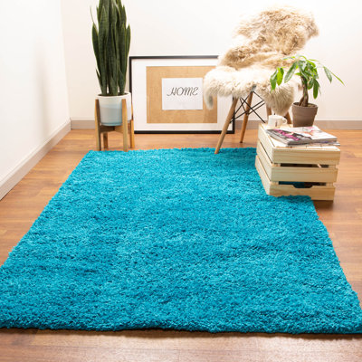 Tapis turquoise tissé à la machine Deatherage