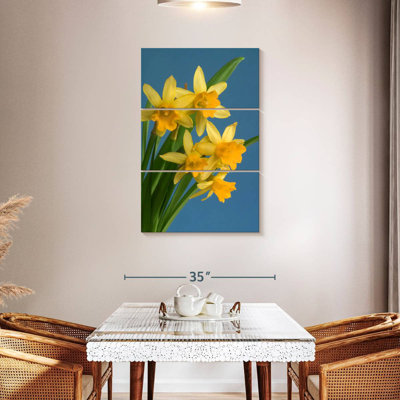 Jonquilles jaunes sur fond bleu Harnek