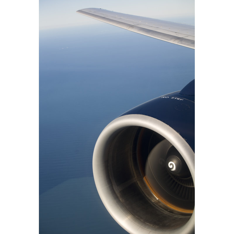 Airplane Engine, Wing Flying Over Water by Carterdayne - No Frame Art Prints on Canvas, 76cm H x 51cm W