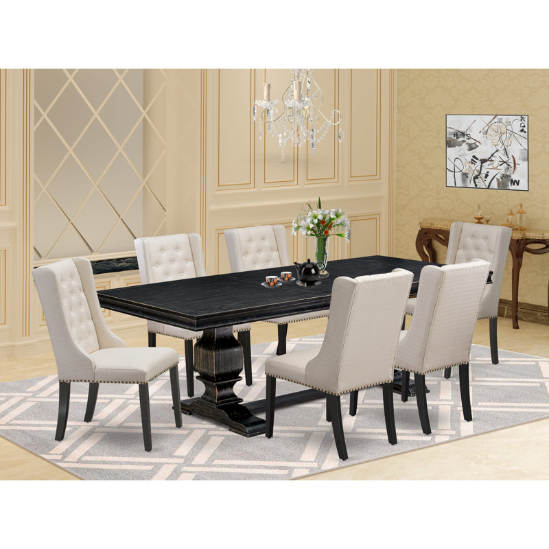 Cet ensemble de salle à manger 7 pièces comprend une table de petit-déjeuner et 6 chaises parsons en tissu de lin crème avec dossier capitonné - noir sablé.