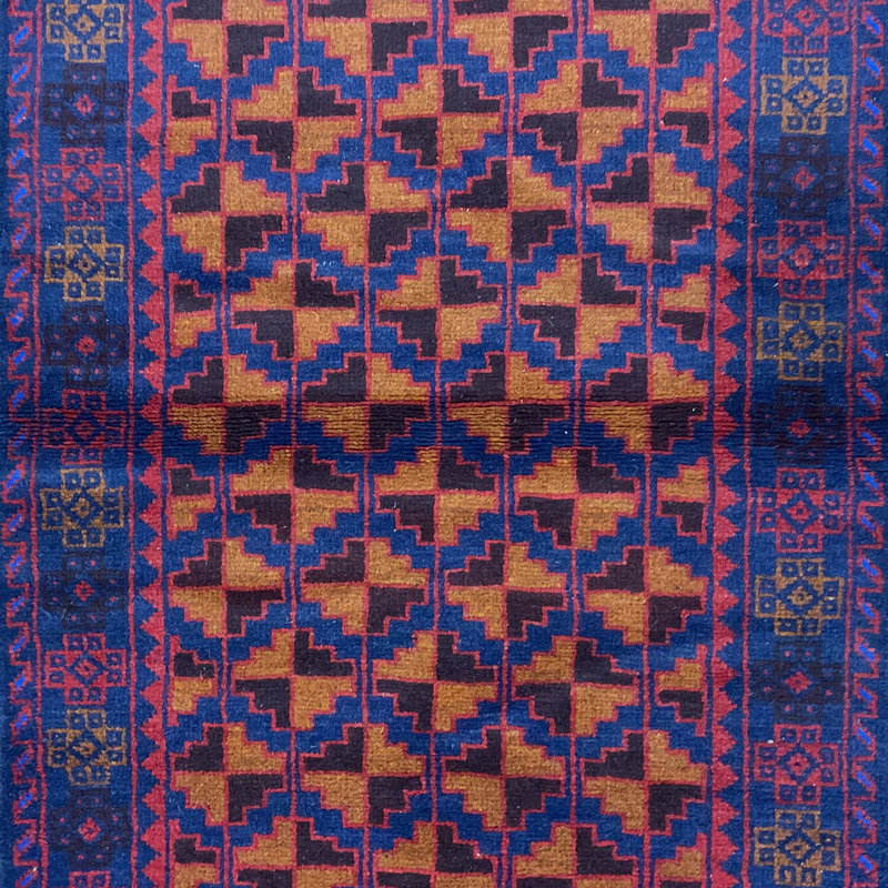 Tapis orange / bleu marine Hilario