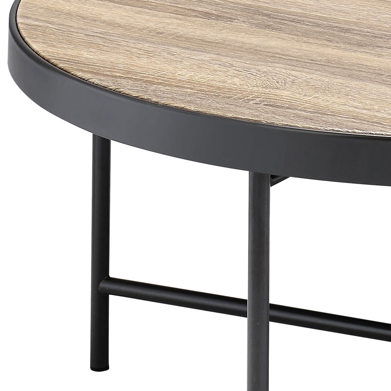 Table basse ronde avec bordure en métal, beaucoup d'espace au fini industriel gris et noir, noir, surface en bois