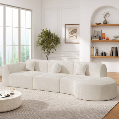140" Upholstered Curved Sectional With Chaise