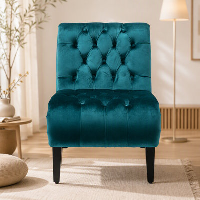 Fauteuil d'appoint confortable en velours sans accoudoirs pour diverses pièces, rehaussant le style intérieur