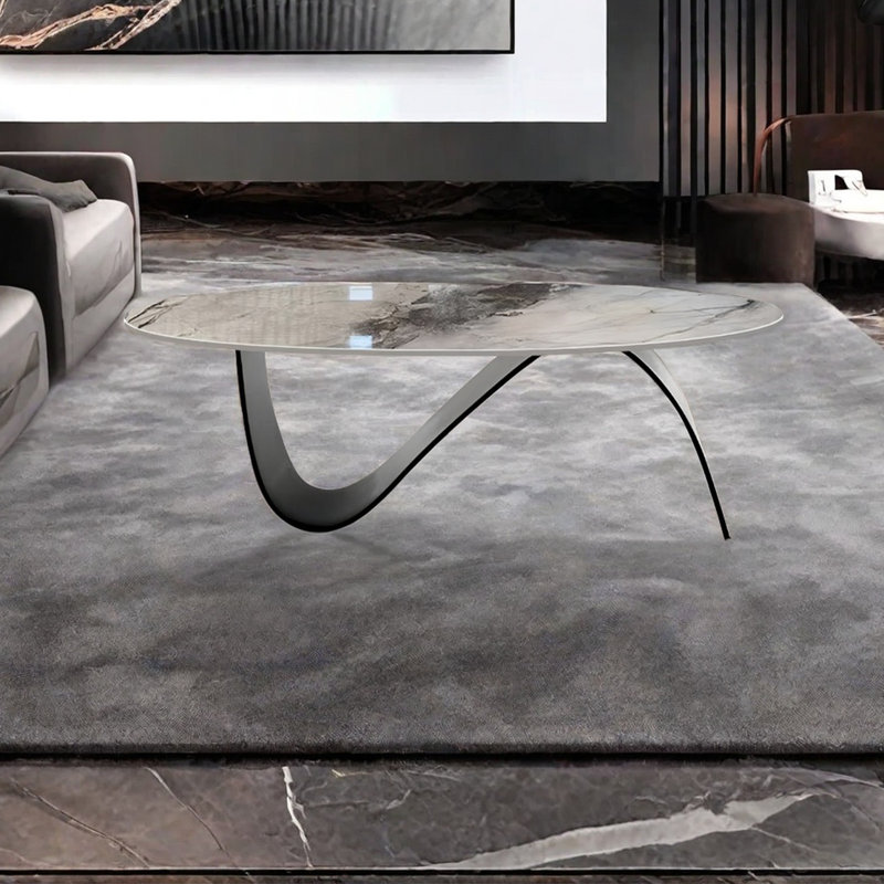 Simple stainless steel oval rock table, 16.5" H x 55.1" L x 31.5" W