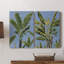 Feuilles de bananier sur toile tendue bleue I-Premium - prête à être accrochée-108968801