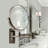 OVENTE 7" Wall Mounted Makeup Mirror with 1X/7X Magnification, Double Sided Magnifying Round Bathroom Vanity Mirror, 360° Swivel Design, Extendable and Folding Arm, Antique Bronze MNLFW70ABZ1X7X-53098058-53098054-53098052