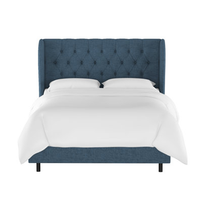 Tomey Upholstered Wingback Bed