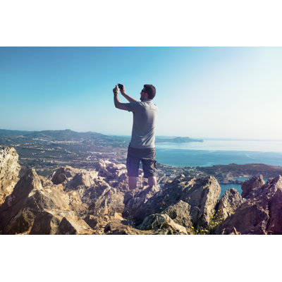 Tourist Takes Photo by Mikkelwilliam