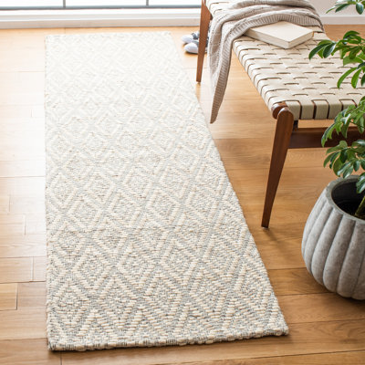 Tapis beige / crème en laine / coton touffeté à la main Jerimiah