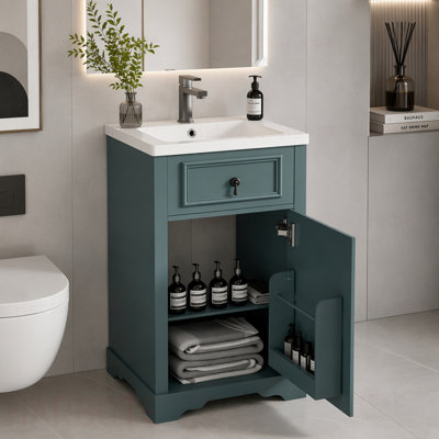 Meuble-lavabo de salle de bain avec lavabo en céramique, porte à fermeture douce, tablette réglable et support de rangement fixé à la porte - idéal pour les petites salles de bain