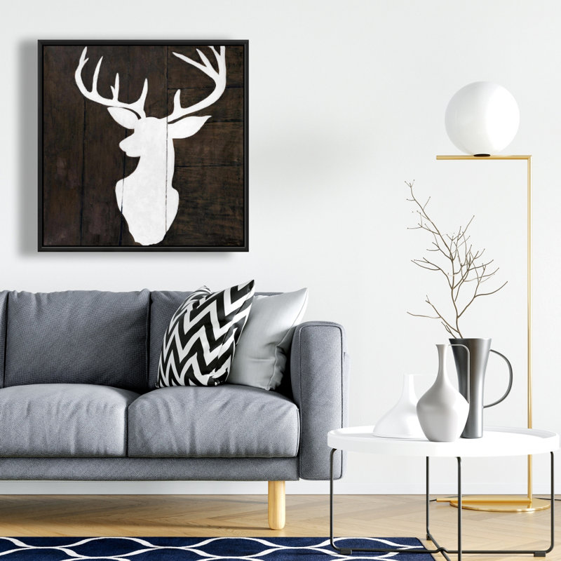 "Silhouette d'un cerf sur bois"